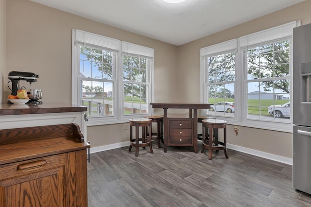 11708 Broad St, Millersport, OH 43046 - office featuring dark wood finished floors, baseboards, and healthy amount of natural light