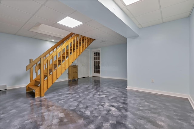 11708 Broad St, Millersport, OH 43046 - finished basement with a drop ceiling, stairs, and baseboards