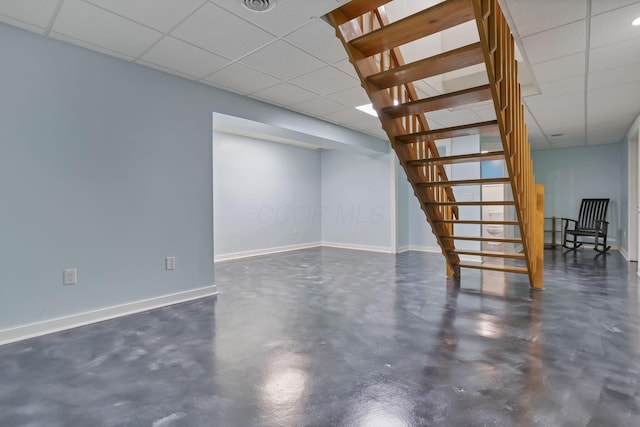11708 Broad St, Millersport, OH 43046 - finished basement with stairs, a drop ceiling, and baseboards