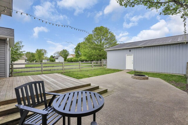 11708 Broad St, Millersport, OH 43046 - view of patio / terrace featuring an outdoor fire pit and a wooden deck
