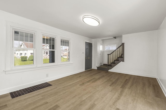 436 Nashoba Ave, Columbus, OH 43223 - foyer featuring wood finished floors, stairway, and baseboards