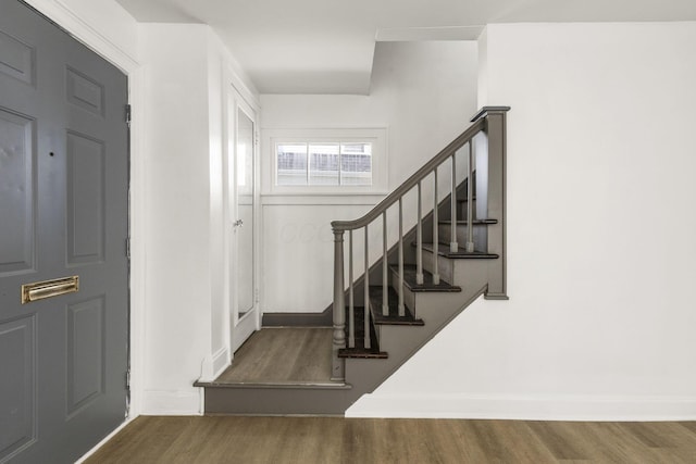 436 Nashoba Ave, Columbus, OH 43223 - entrance foyer featuring wood finished floors, stairway, and baseboards
