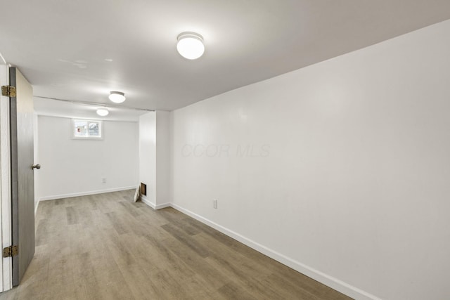 436 Nashoba Ave, Columbus, OH 43223 - below grade area featuring light wood finished floors and baseboards