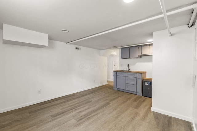 436 Nashoba Ave, Columbus, OH 43223 - finished basement featuring wet bar, wood finished floors, baseboards, and recessed lighting