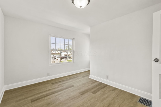436 Nashoba Ave, Columbus, OH 43223 - unfurnished room featuring wood finished floors and baseboards