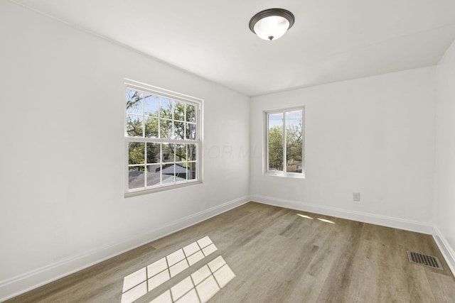 436 Nashoba Ave, Columbus, OH 43223 - empty room featuring healthy amount of natural light, wood finished floors, and baseboards