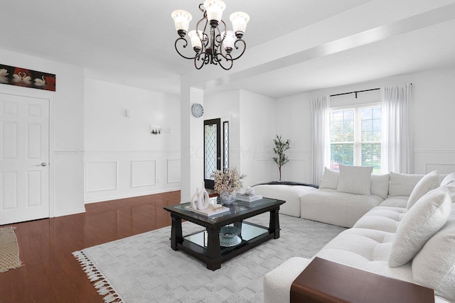 210 Carson Ct, Pickerington, OH 43147 - living area with a chandelier, wainscoting, hardwood / wood-style floors, and a decorative wall
