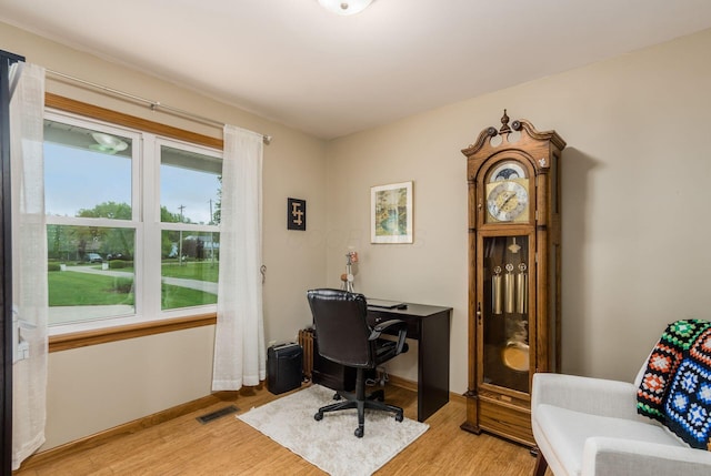 1380 E Choctaw Dr, London, OH 43140 - home office featuring light wood-type flooring and baseboards