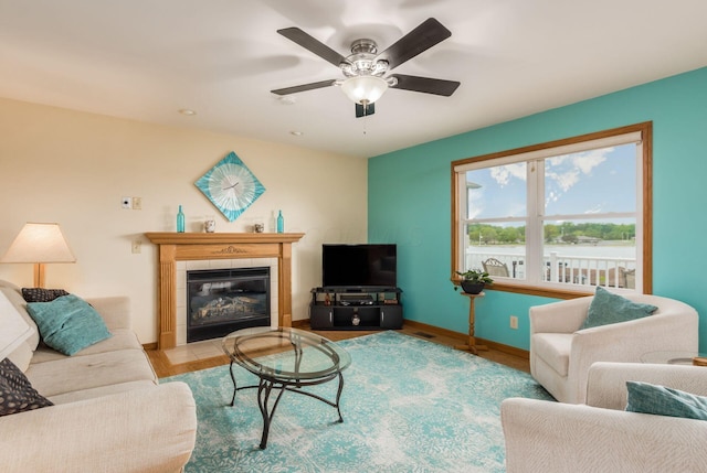 1380 E Choctaw Dr, London, OH 43140 - living room featuring wood finished floors, a fireplace, baseboards, ceiling fan, and recessed lighting