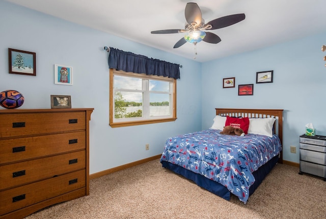 1380 E Choctaw Dr, London, OH 43140 - carpeted bedroom featuring baseboards and ceiling fan