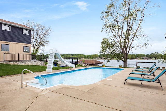 1380 E Choctaw Dr, London, OH 43140 - outdoor pool with a water slide, a patio area, and a yard