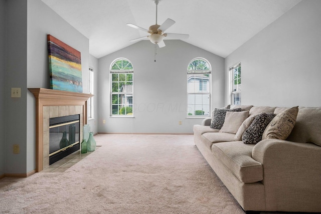 1272 Villa Oaks Ct, Columbus, OH 43230 - carpeted living room featuring a ceiling fan, a fireplace, vaulted ceiling, and baseboards