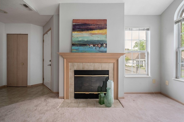 1272 Villa Oaks Ct, Columbus, OH 43230 - unfurnished living room featuring carpet, a tile fireplace, and baseboards