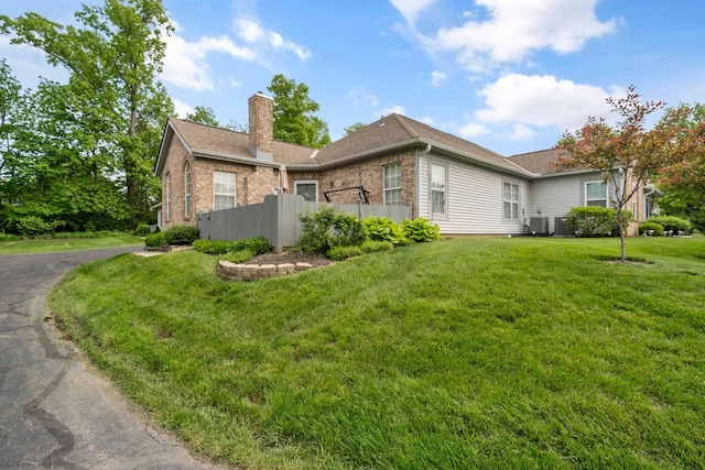 1272 Villa Oaks Ct, Columbus, OH 43230 - view of property exterior featuring a chimney and brick siding