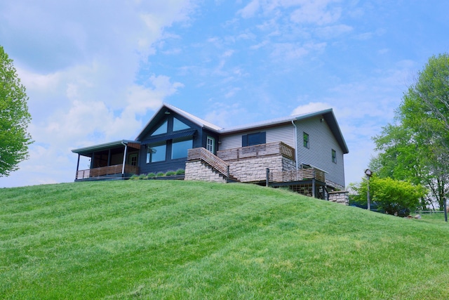 2215 Township Road 362 SE, Junction City, OH 43748 - rear view of property featuring a yard and stone siding