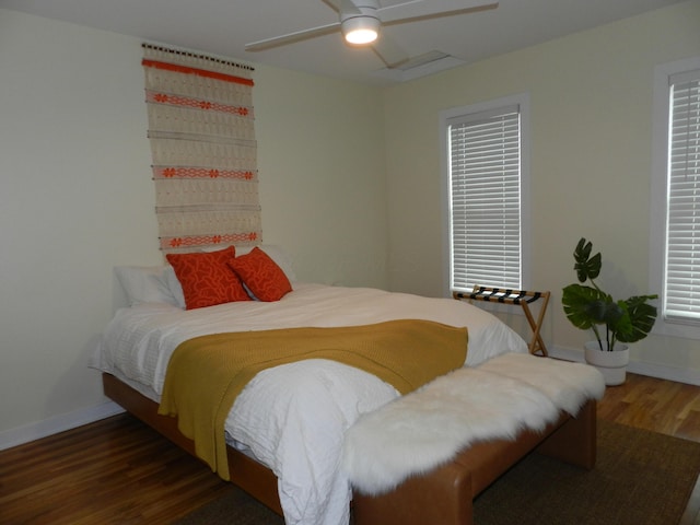 236 E 4th Ave, Columbus, OH 43201 - bedroom featuring wood finished floors, baseboards, and ceiling fan
