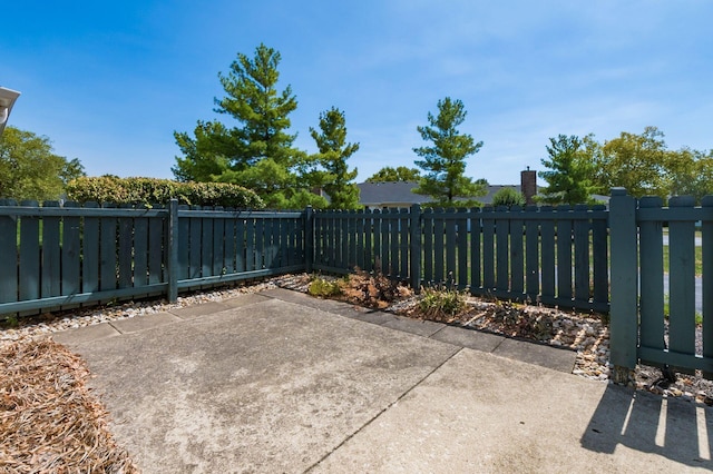 2412 Warm Springs Dr, Hilliard, OH 43026 - fenced backyard featuring a patio area