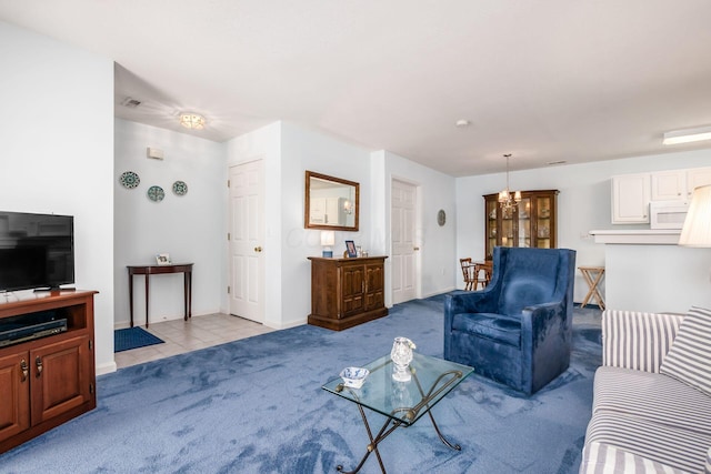 2412 Warm Springs Dr, Hilliard, OH 43026 - living room featuring light colored carpet, baseboards, and a chandelier