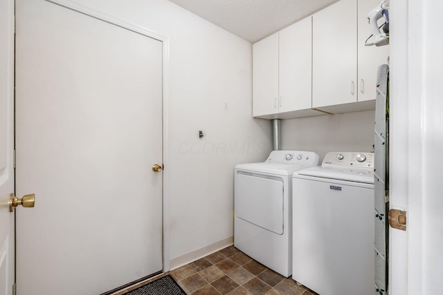 2412 Warm Springs Dr, Hilliard, OH 43026 - washroom with independent washer and dryer, cabinet space, and stone finish floors