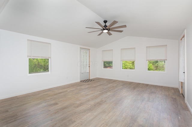 26976 Jackson Rd, Circleville, OH 43113 - spare room featuring ceiling fan, vaulted ceiling, light wood-style floors, and baseboards