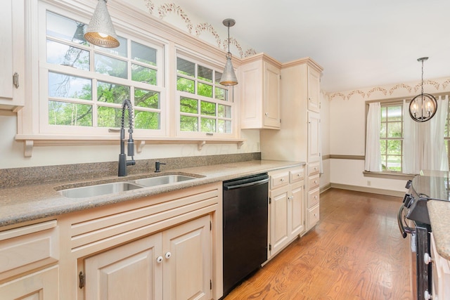 26976 Jackson Rd, Circleville, OH 43113 - kitchen with dishwasher, a sink, electric stove, light wood-type flooring, and decorative light fixtures