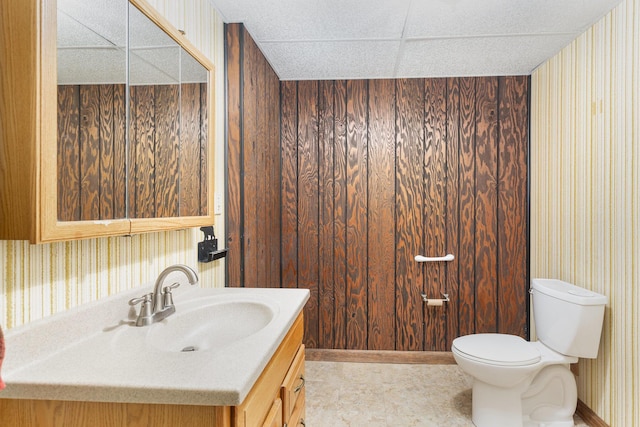 26976 Jackson Rd, Circleville, OH 43113 - bathroom featuring wallpapered walls, toilet, vanity, and baseboards
