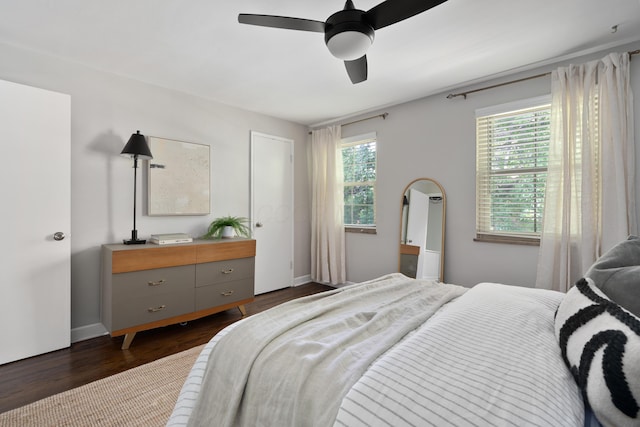 1809 NW Ct Unit E, Columbus, OH 43212 - bedroom featuring dark wood-style flooring and a ceiling fan