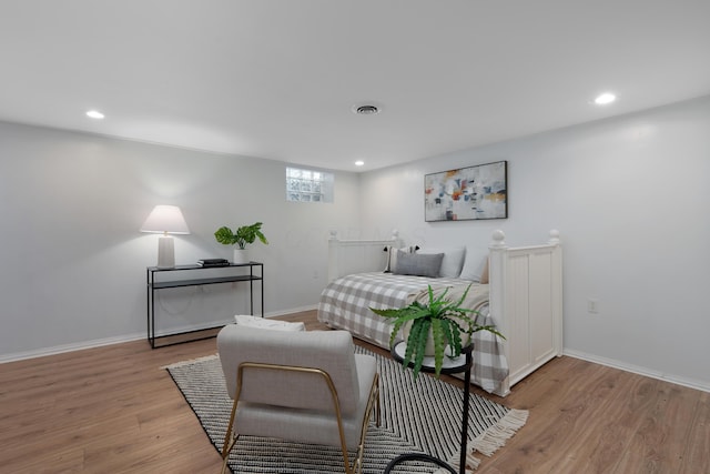 1809 NW Ct Unit E, Columbus, OH 43212 - bedroom featuring light wood-type flooring and recessed lighting