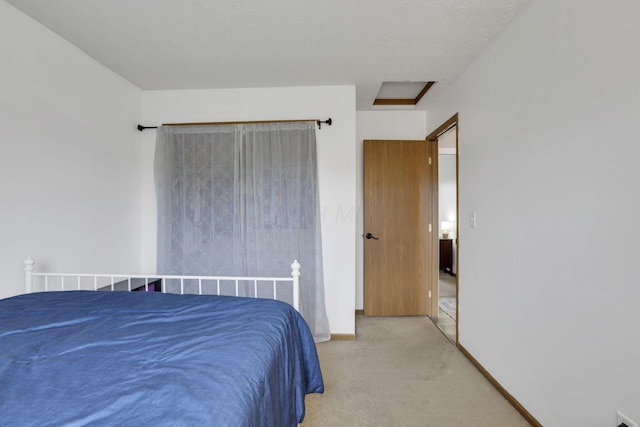 4292 Nipigon Dr, Columbus, OH 43207 - carpeted bedroom with baseboards and attic access