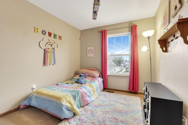 4292 Nipigon Dr, Columbus, OH 43207 - bedroom featuring light colored carpet and baseboards