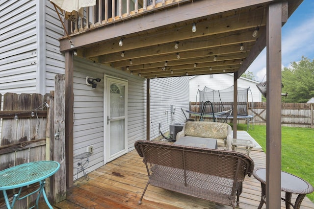 4292 Nipigon Dr, Columbus, OH 43207 - wooden deck with a trampoline