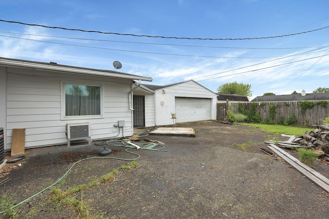 4969 Lockbourne Rd, Columbus, OH 43207 - rear view of house with a garage