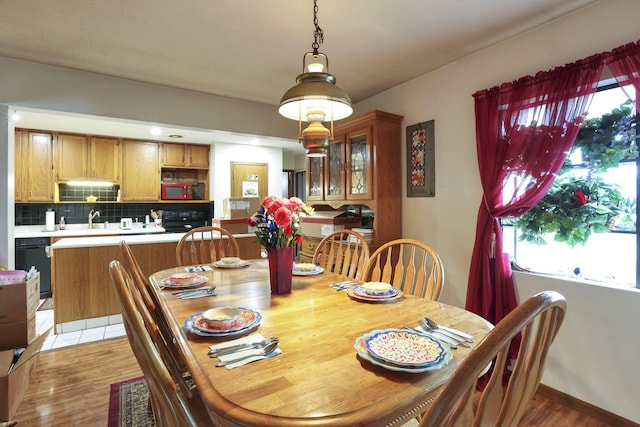 4969 Lockbourne Rd, Columbus, OH 43207 - dining room featuring light wood finished floors