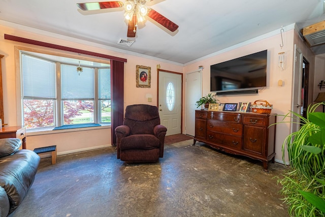 1150 Bahama Dr, Marion, OH 43302 - living area featuring concrete flooring, ceiling fan, ornamental molding, baseboards, and an AC wall unit
