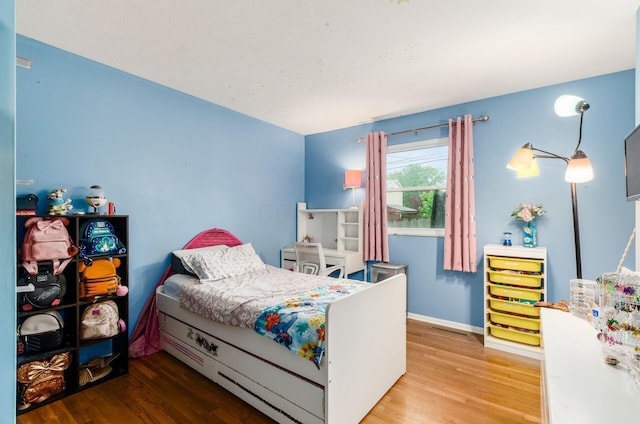 3408 Dahlgreen Dr, Westerville, OH 43081 - bedroom with wood finished floors and baseboards