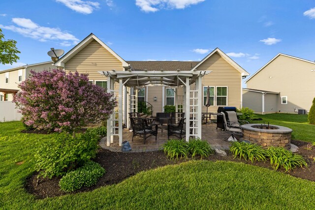 700 Ferguson Ave, Delaware, OH 43015 - rear view of house with a fire pit, a yard, a patio area, and a pergola