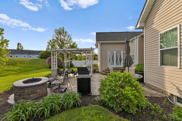 700 Ferguson Ave, Delaware, OH 43015 - view of patio / terrace with a fire pit, french doors, and grilling area