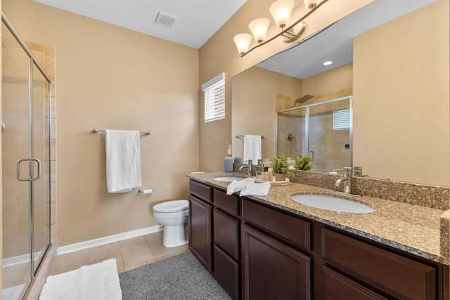 700 Ferguson Ave, Delaware, OH 43015 - bathroom with a stall shower, double vanity, and tile patterned floors