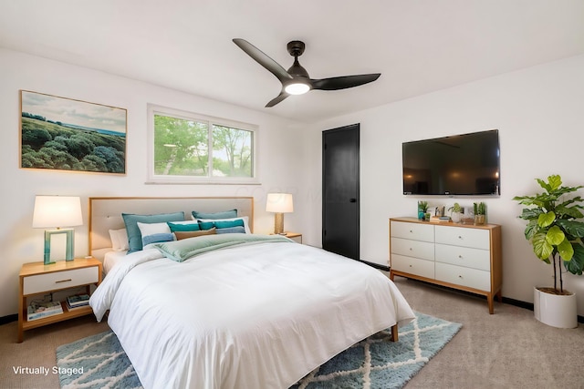 bedroom featuring carpet and ceiling fan