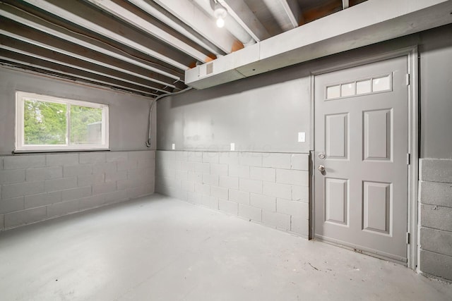 below grade area with concrete block wall