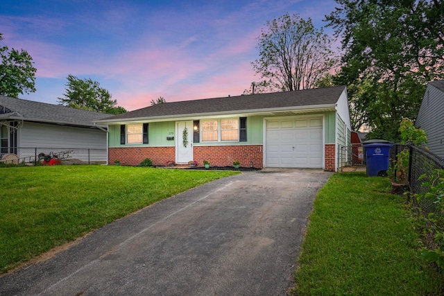 273 E Alcott Rd, Columbus, OH 43207 - single story home featuring brick siding, driveway, an attached garage, and board and batten siding