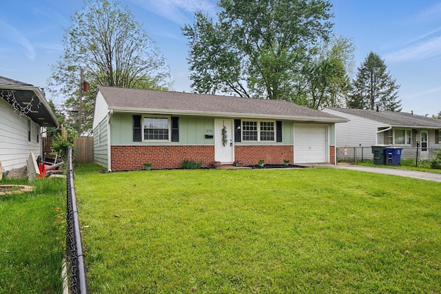 273 E Alcott Rd, Columbus, OH 43207 - view of front of house with brick siding, concrete driveway, a garage, and board and batten siding