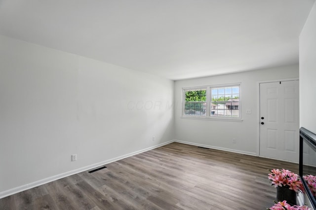273 E Alcott Rd, Columbus, OH 43207 - foyer featuring dark wood-type flooring and baseboards