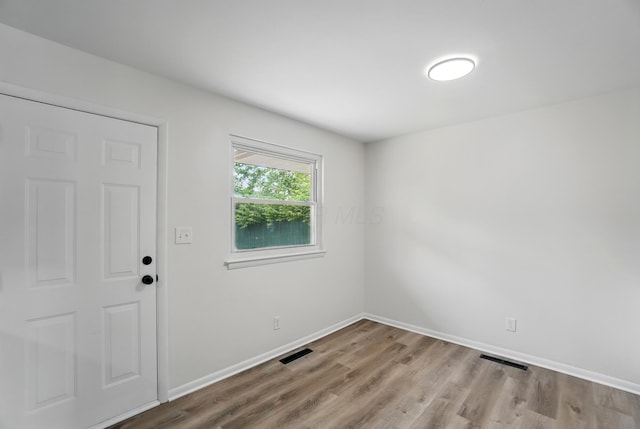273 E Alcott Rd, Columbus, OH 43207 - spare room with wood finished floors and baseboards
