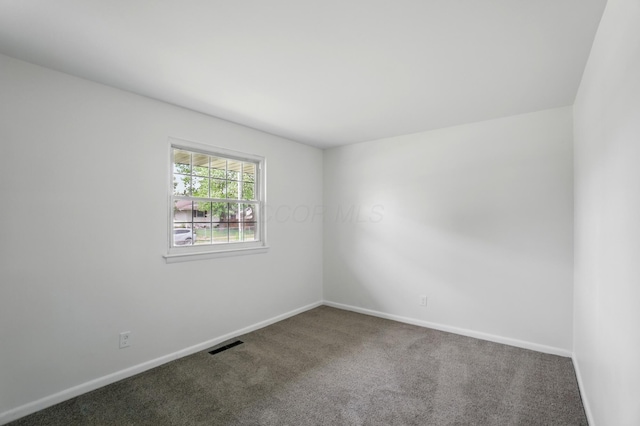 273 E Alcott Rd, Columbus, OH 43207 - unfurnished room featuring carpet floors and baseboards