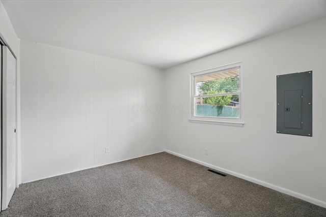273 E Alcott Rd, Columbus, OH 43207 - carpeted empty room featuring electric panel and baseboards