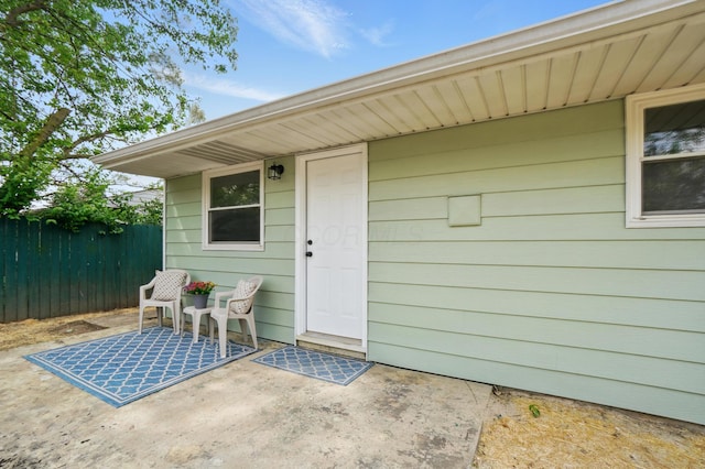 273 E Alcott Rd, Columbus, OH 43207 - doorway to property with fence and a patio