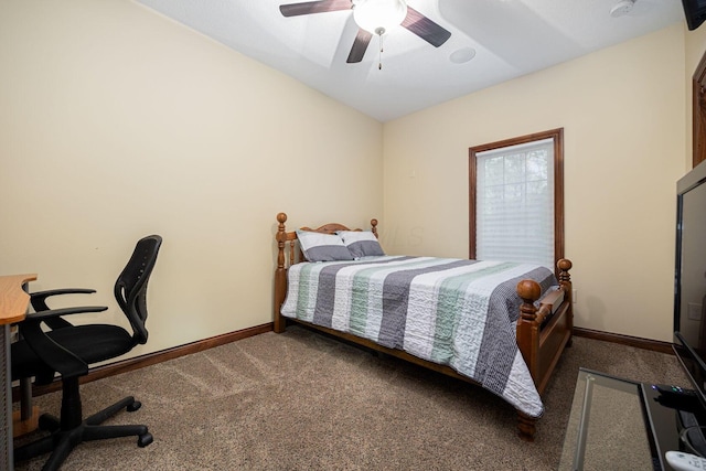 bedroom featuring carpet floors, baseboards, a ceiling fan, a desk, and vaulted ceiling
