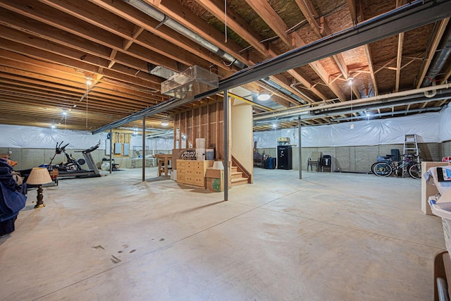 unfinished basement with stairs