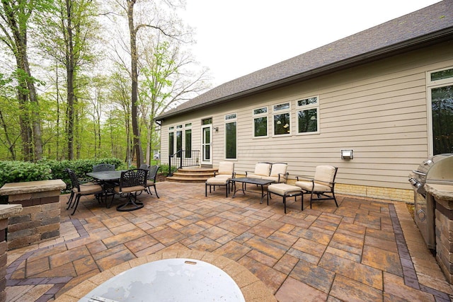 view of patio featuring an outdoor hangout area and outdoor dining space